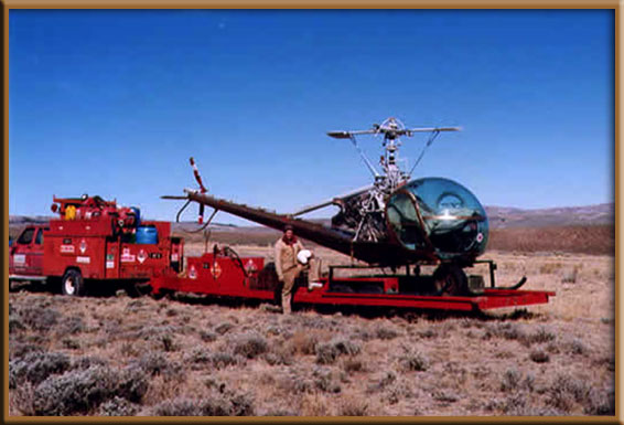Helicopter loaded on trailer.